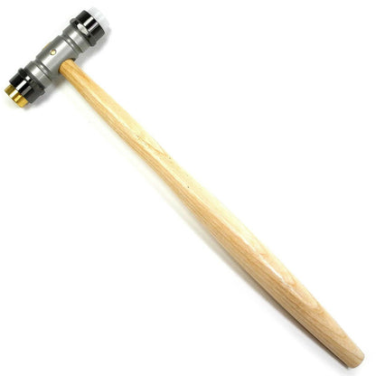 Bergeon 30417 hammer with brass and synthetic ends for precise watch repair and adjustment tasks.