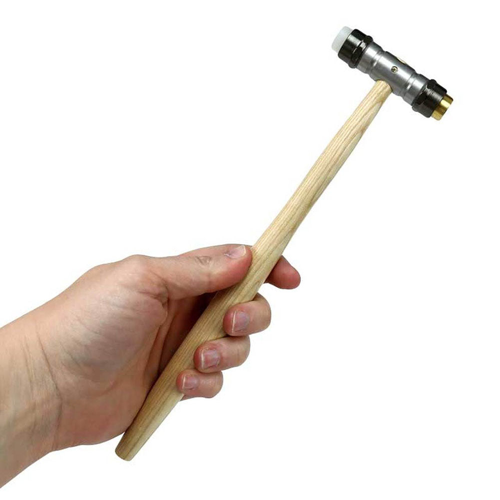Bergeon 30417 hammer with brass and synthetic ends for precise watch accessory repairs.