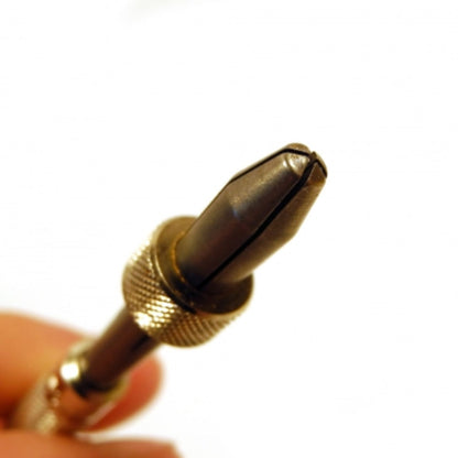 Bergeon 30432 pin vice securely holding watchmaker drills for precise watch repair tasks