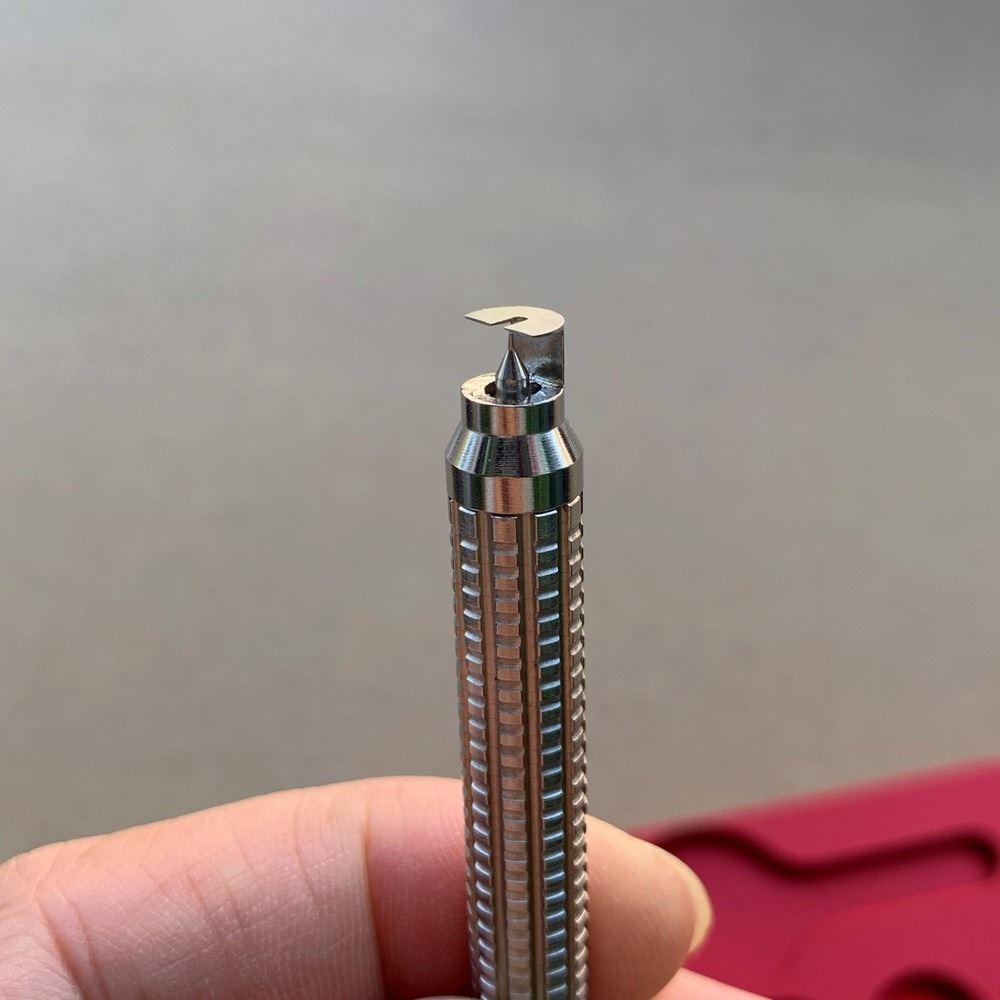 Watch Repair Tool with 12 precision tips, perfect for safe hand removal in watchmaking.