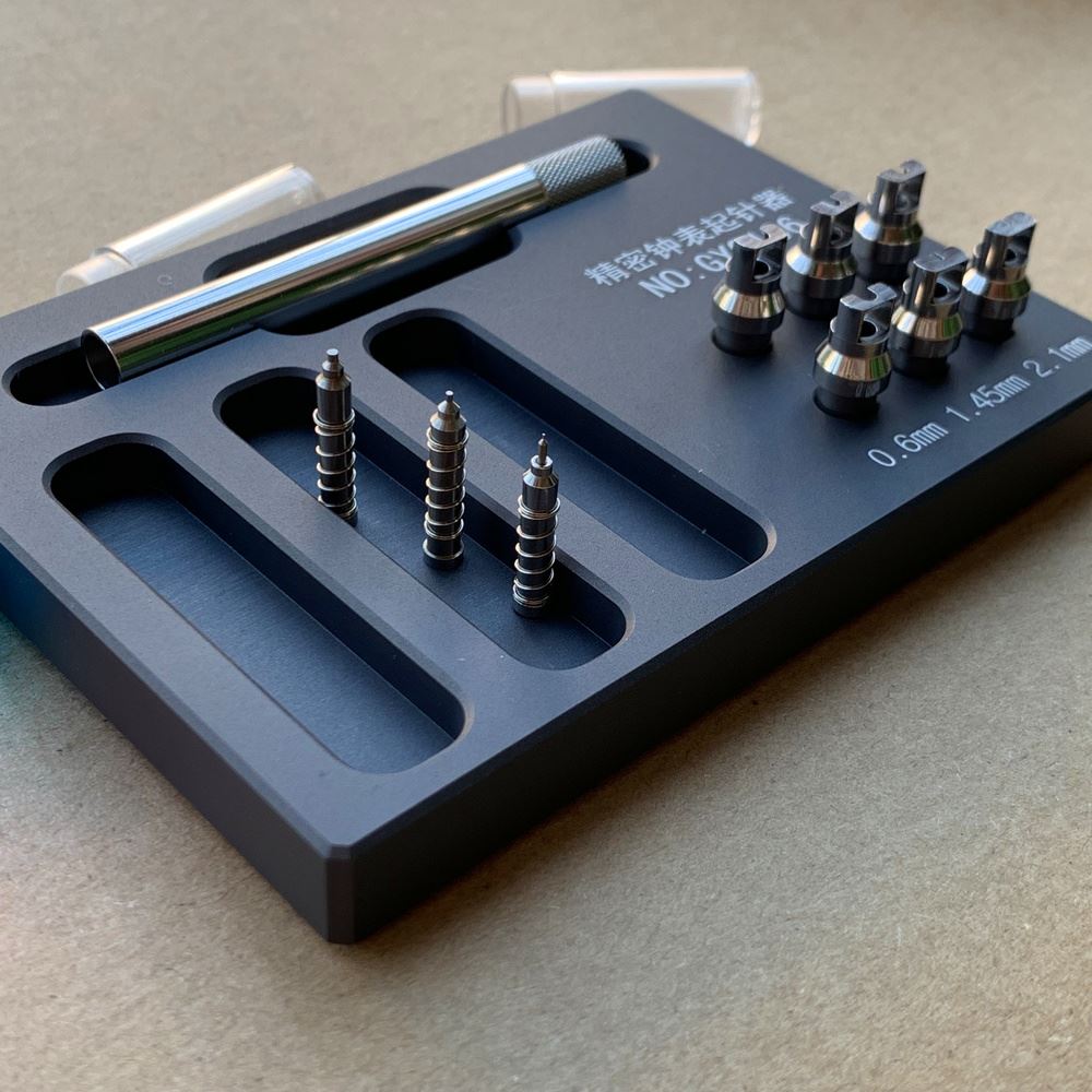 Stainless steel watch hand remover tool, precision removal for delicate watch repairs.