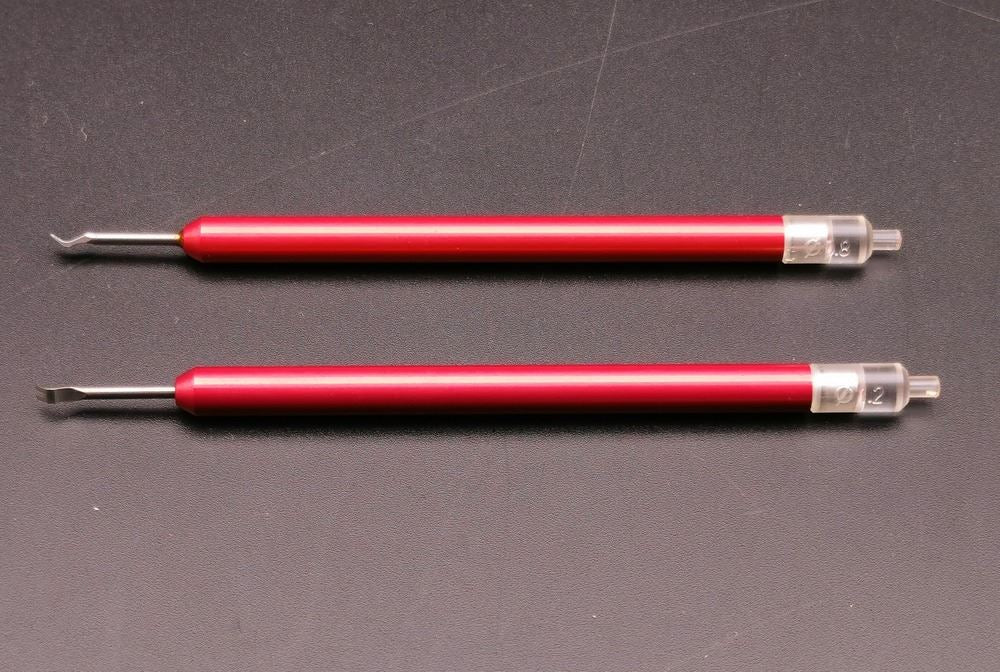 Rubber head needle punch tool set for watch hand setting, durable precision tool.