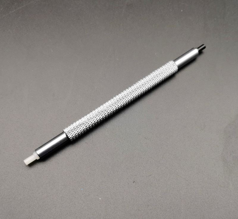 Set of 3 double-headed plastic watch hands tools for precise fitting and pressing.