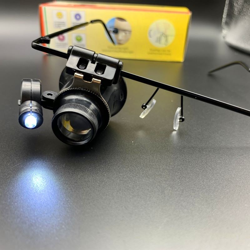 20X watch repair magnifier with dual adjustable LED lights for precise watch accessory inspection.