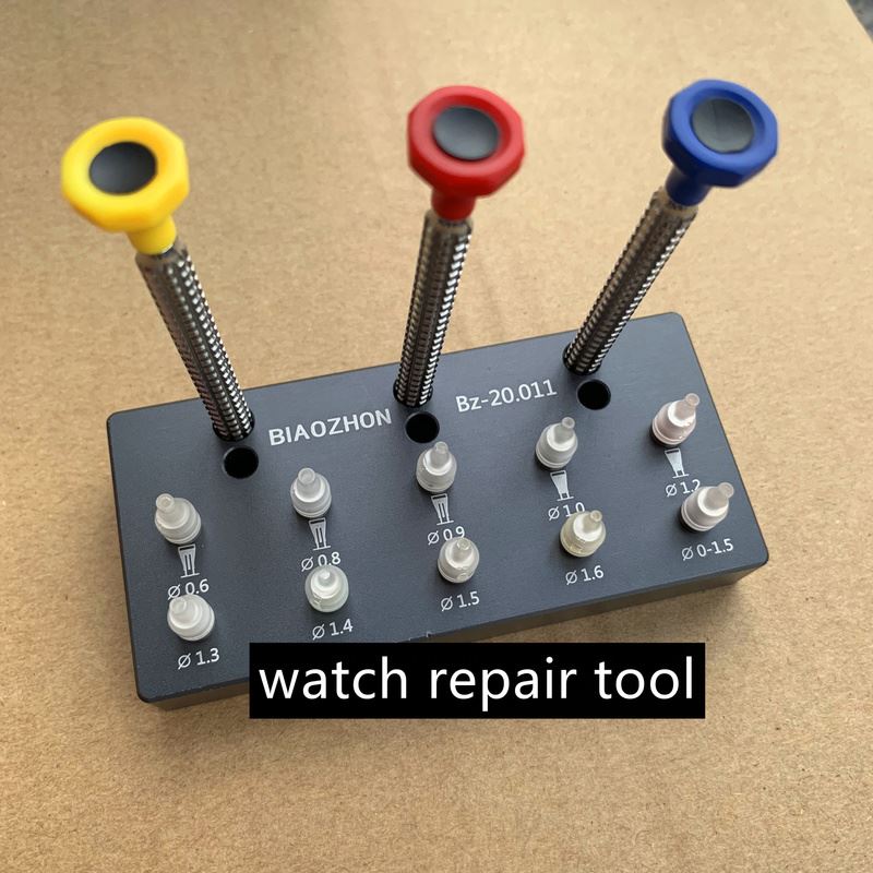 Watch hand install tool with 10 replaceable tips for precise fitting.