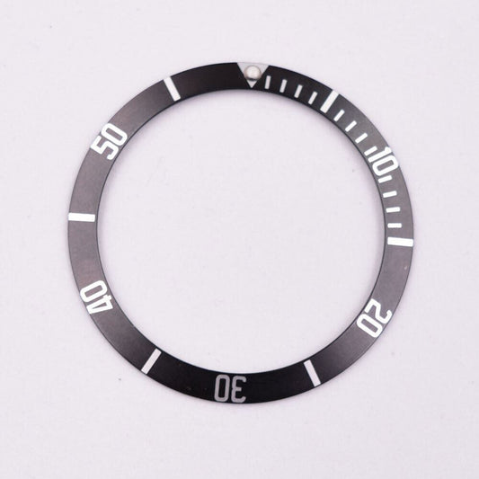 Black 39.5mm aluminium bezel insert for automatic SUB/GMT watch enhancing durability and style.