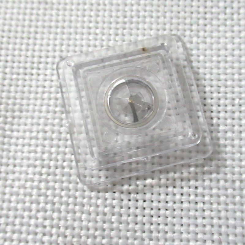 Silver watch balance wheel for movement 7009#721, compatible with various watch repairs and adjustments.