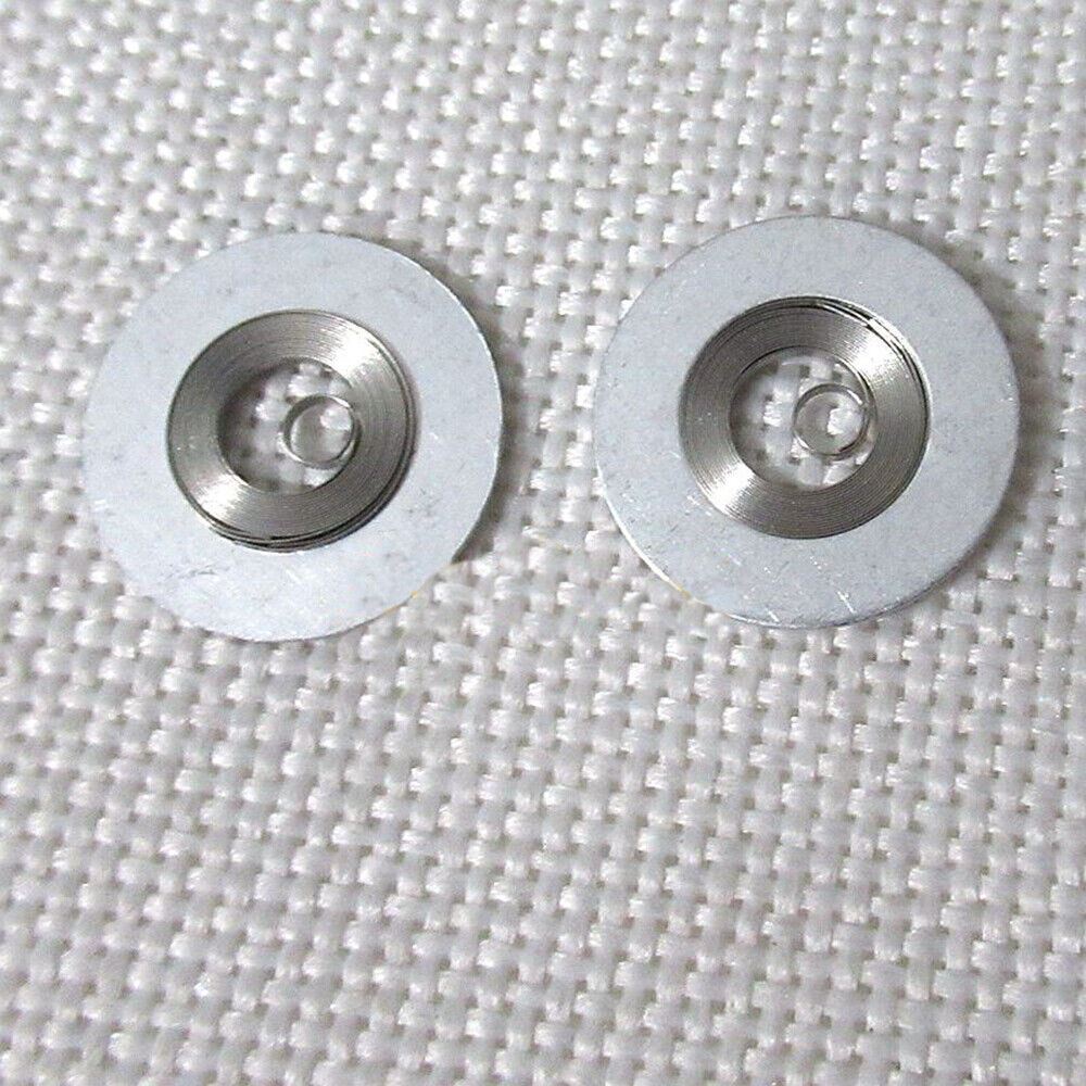 Silver mainspring watch part compatible with Movement 7009#180, ideal for precise repairs and maintenance.