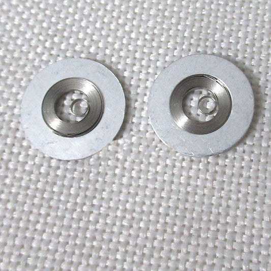 Silver mainspring watch part compatible with Movement 7009#180, ideal for precise repairs and maintenance.