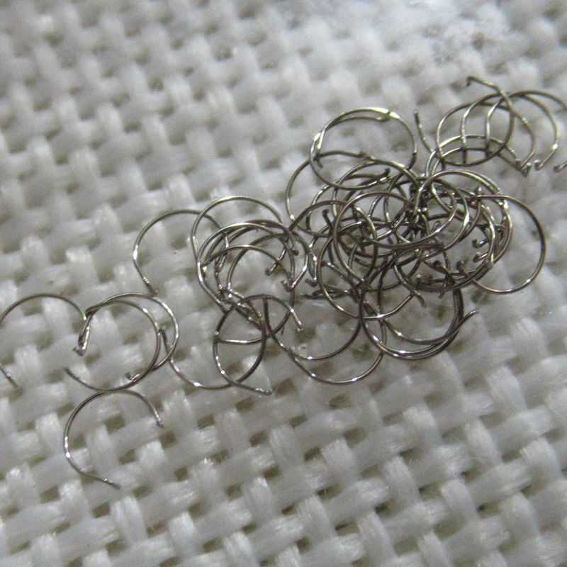 Silver spring click watch part compatible with Movement 46945, generic fit for precise repairs