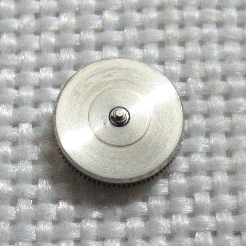 Complete barrel with new mainspring for NH05 NH06 movement, generic fit, reliable watch accessory.