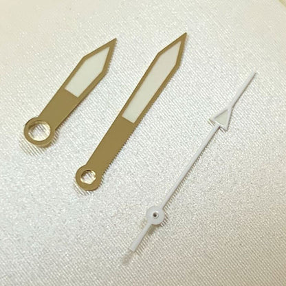 Green luminous golden watch hands set for NH35A/NH36A/4R36 movement, ideal watch repair accessory.