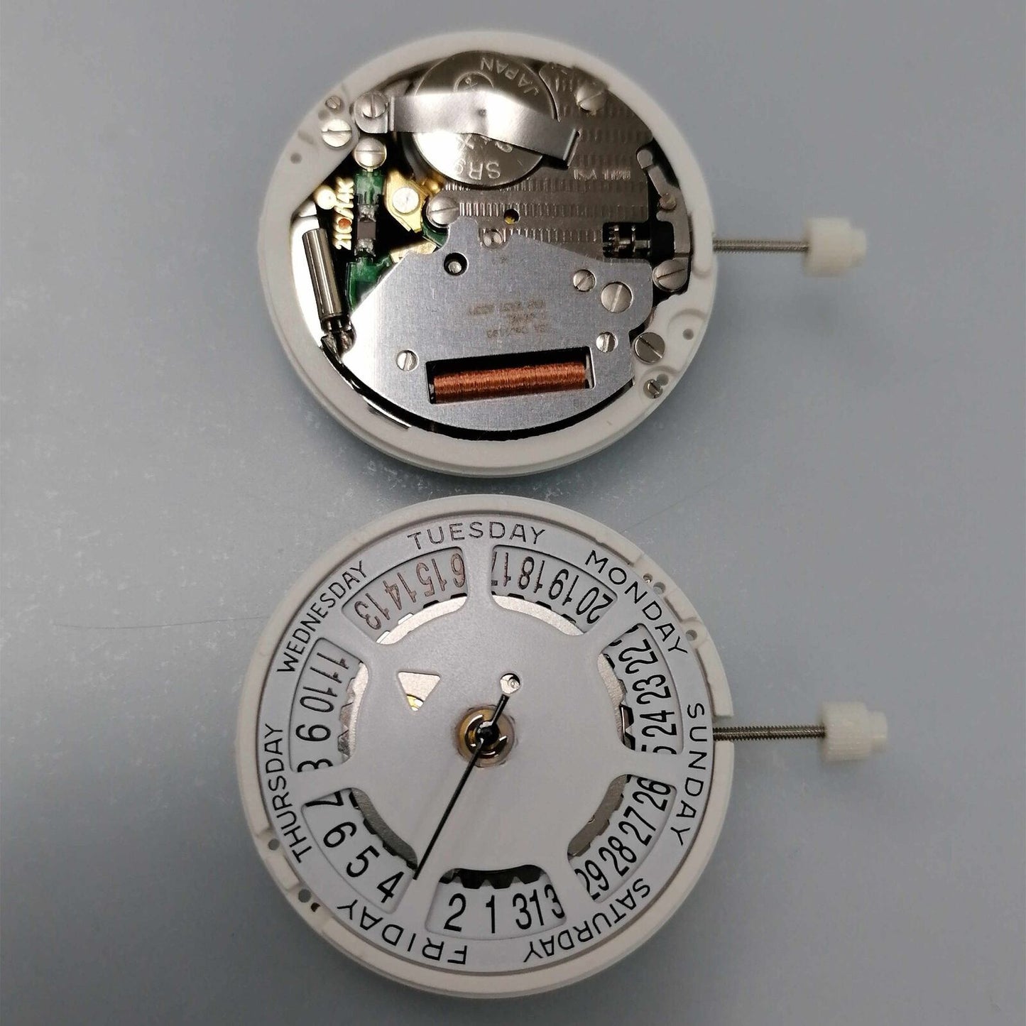 Watchmakers ISA 1198 quartz day-date watch movement with white dial, date at 6 position, replacement part.