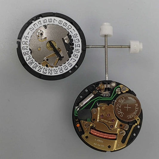 Watchmakers ISA 338 quartz movement repair part replacing J328/103 for accurate timekeeping maintenance.