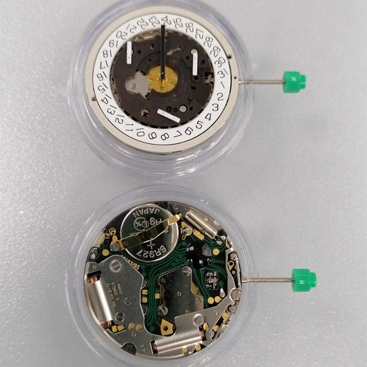 Watchmakers ISA 8172 silver quartz movement with date display at 4 o'clock and watch stem.