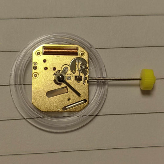 ISA 125 golden quartz movement with stem for precise watch repair and assembly by Watchmakers.