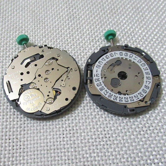 OS60 Quartz Movement watch part with small second hand at 6, 9, and 12 o'clock positions.