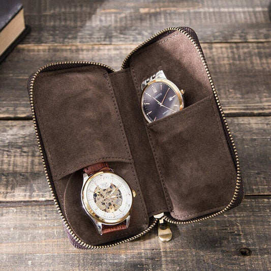 Brown leather 2-slot watch box, luxury portable pouch with zipper for secure watch storage.