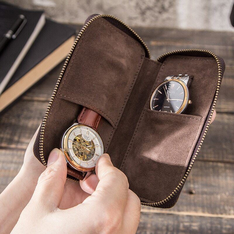 Brown leather 2-slot watch box, luxury portable pouch with zipper for secure watch storage.