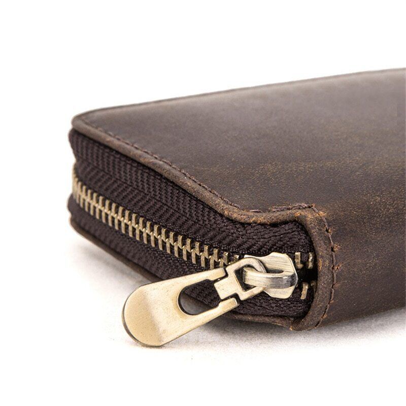 Brown leather 2-slot watch box, portable luxury pouch with zipper for secure watch storage and travel.