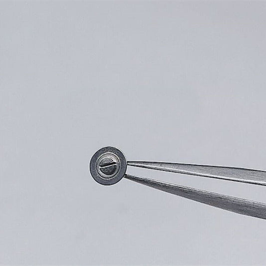 Small movement screws for ETA C07.111 ratchet wheel, precision watch accessory for repair and maintenance.