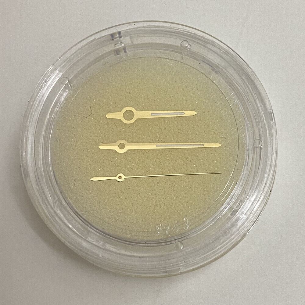 Golden luminous watch hands for ETA 2892 movement, enhancing low-light visibility with elegant design.