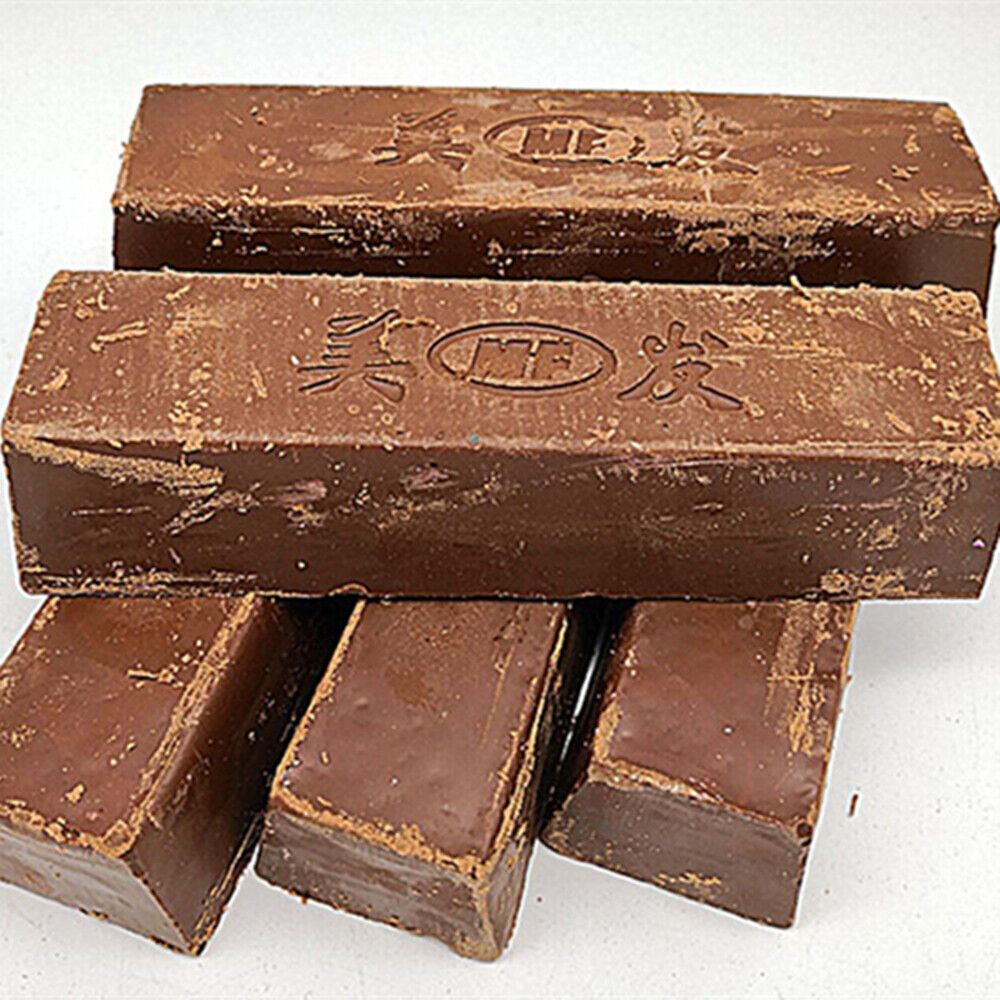 Brown stainless steel polishing compound for jewelry and watch repair, ideal for restoring shine.