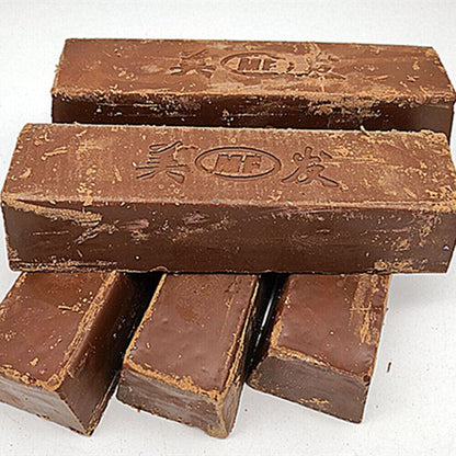 Brown stainless steel polishing compound for jewelry and watch repair, ideal for restoring shine.