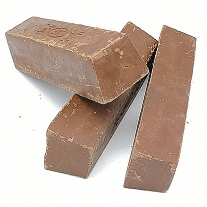 Brown stainless steel polishing compound for jewelry and watch repair, restoring shine quickly.