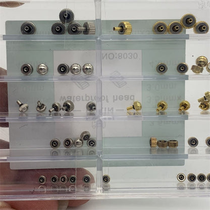 Assortment of stainless steel waterproof watch crowns for precise repairs.