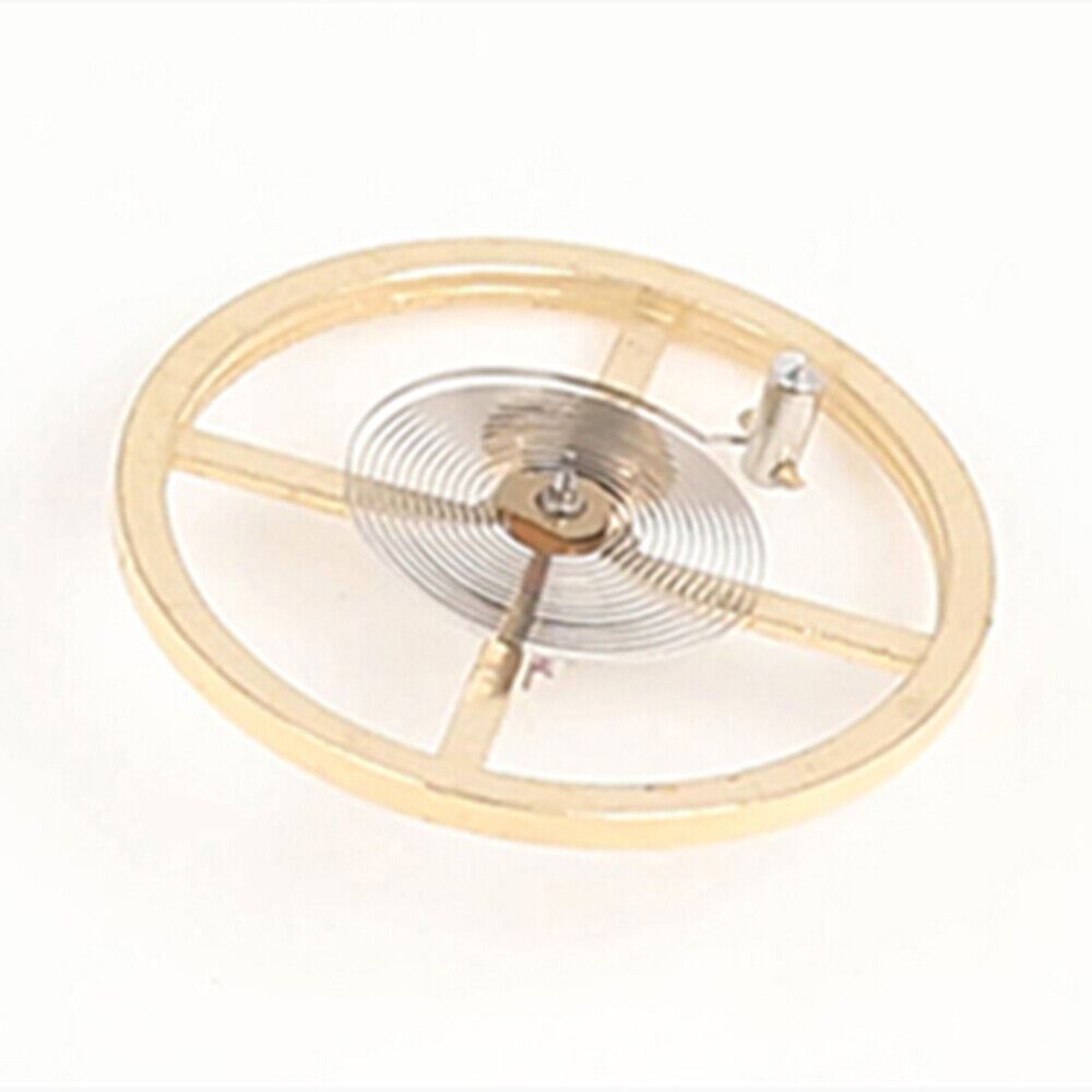 Golden balance wheel with hairspring for 2189 movement watch repair.