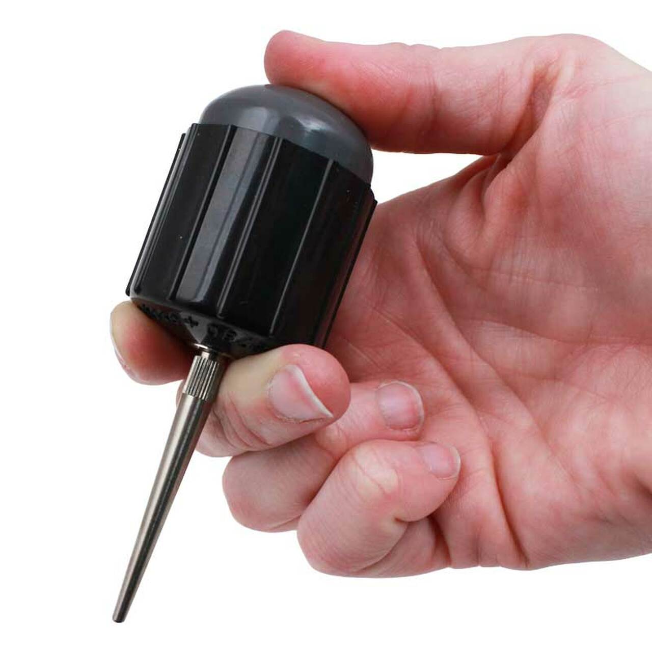 Bergeon 30540 Bakelite blower removing dust from watch components for precision cleaning.