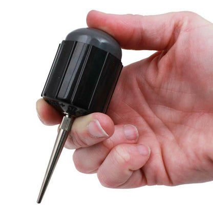 Bergeon 30540 Bakelite blower removing dust from watch components for precision cleaning.