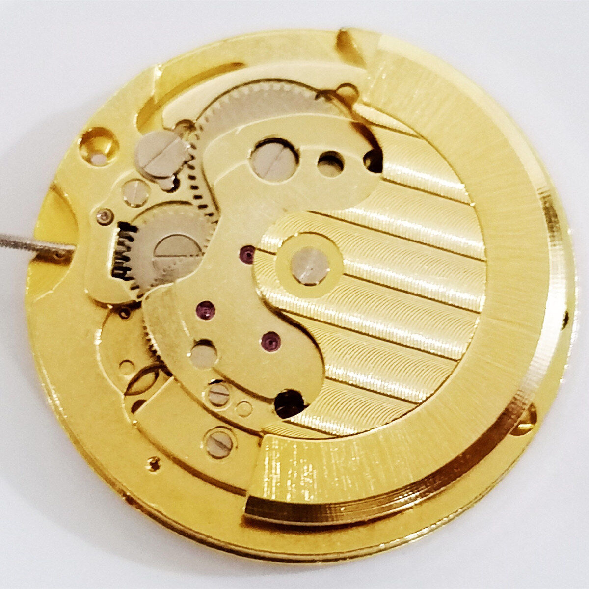 Dandong gold automatic watch with mechanical hollow design and moon phase at 12 o'clock