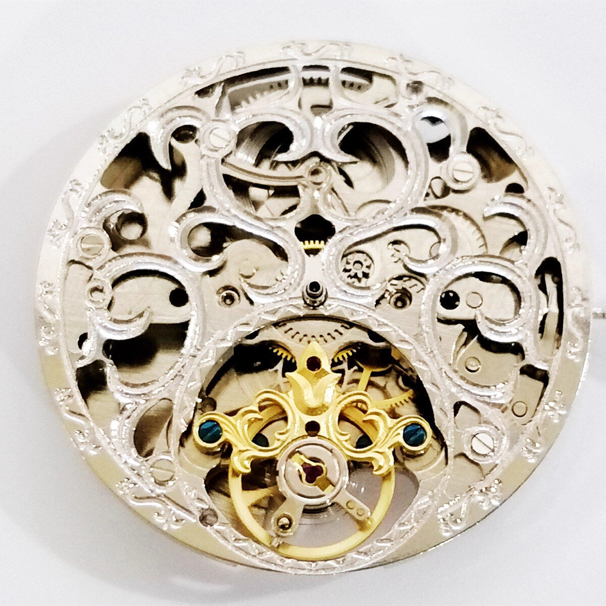 Dandong Silver carved automatic watch with mechanical movement and hollow design, stylish accessory.