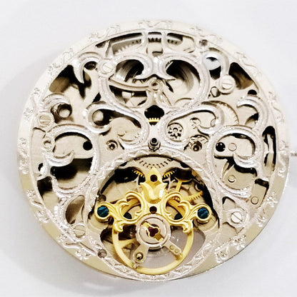 Dandong Silver carved automatic watch with mechanical movement and hollow design, stylish accessory.