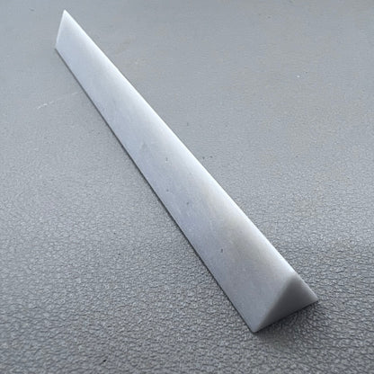 Horotec MSA16.013 Arkansas triangular sharpening stone for precise watch tool maintenance and polishing.