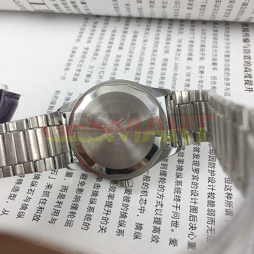 Shanghai Factory 36.5mm manual mechanical watch with 19 jewels, shock-resistant design for durability.