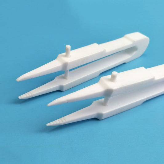 PTFE precision tweezers, anti-adhesive for silicon wafer circuit repair and lab maintenance experts.