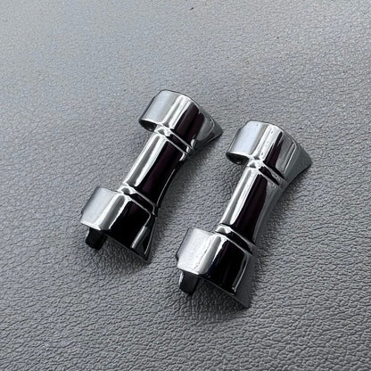 Set of 2 silver steel curved end links with spring bars for 24x12mm watch bands, enhancing bracelet fit.