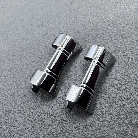 Set of 2 silver steel curved end links with spring bars for 24x12mm watch bands, enhancing bracelet fit.