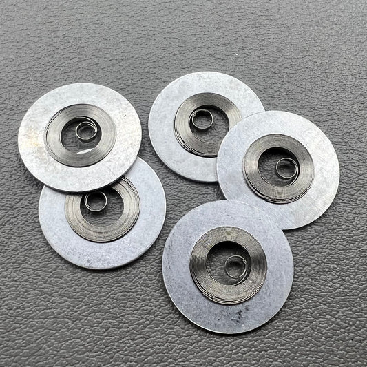 1. Silver mainspring set for 7S26#180 movement, compatible with various watch models.  