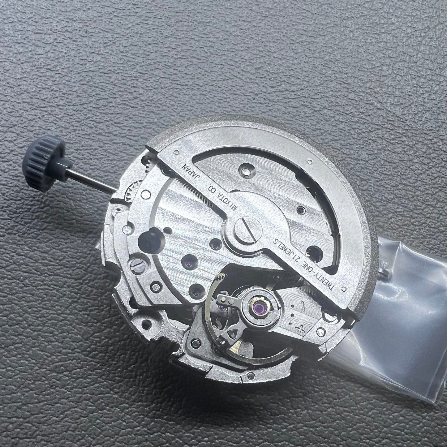 Japan Miyota 82S0 silver hollow automatic mechanical watch movement with visible gear design for precision timekeeping