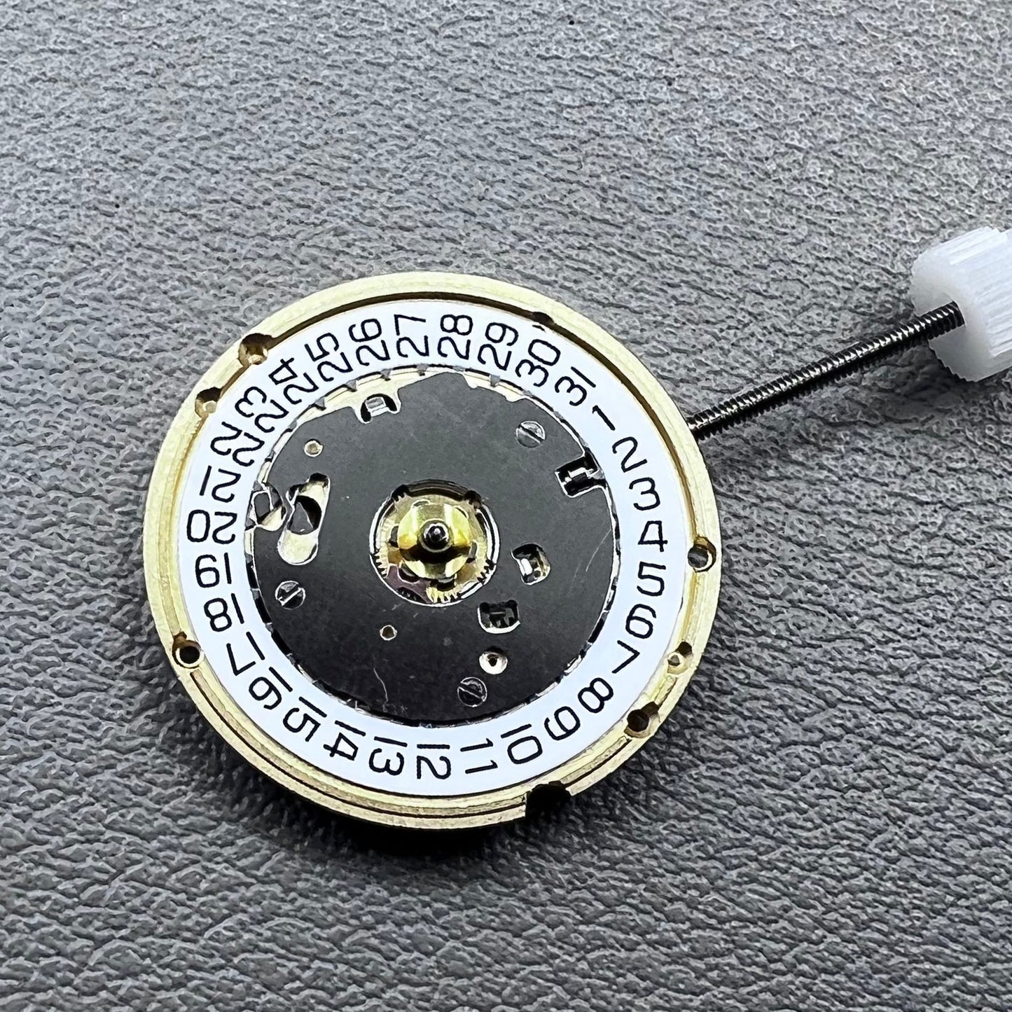 Swiss ETA E61.111 quartz watch movement with date at 3, replacement for 256.111 models, precision timing.