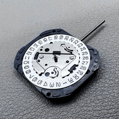 Japan VX22 quartz watch movement with date at 3 o'clock, white disk replacement for precision.