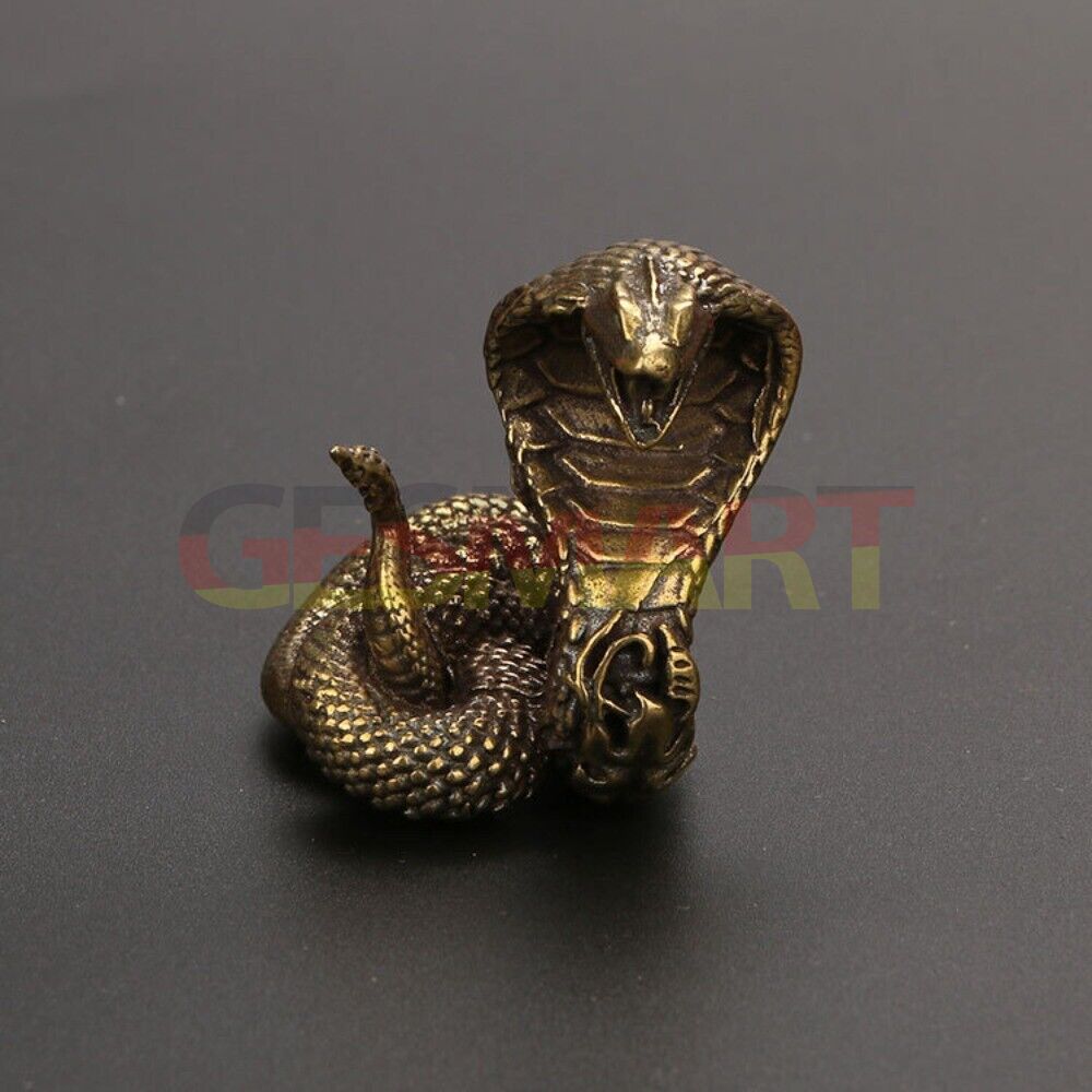 Solid copper cobra trinket, vintage hand-carved bronze figurine, detailed snake sculpture.