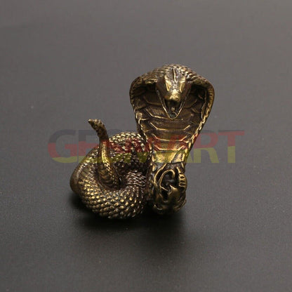 Solid copper cobra trinket, vintage hand-carved bronze figurine, detailed snake sculpture.