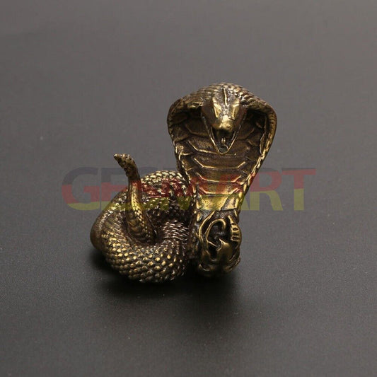 Solid copper cobra trinket, vintage hand-carved bronze figurine, detailed snake sculpture.