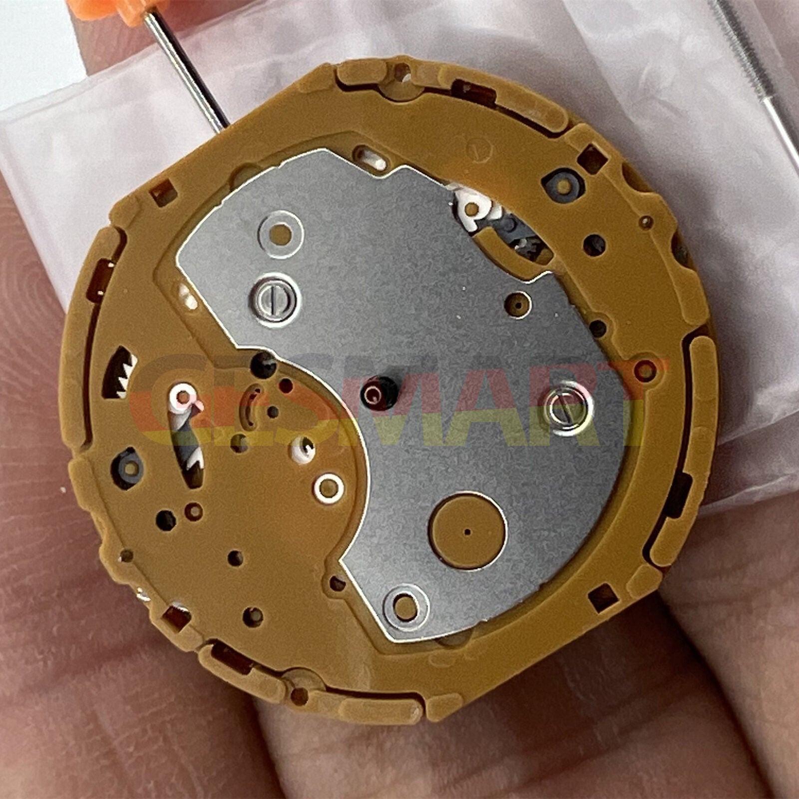 Miyota GP50 Japan quartz movement close-up showcasing precision watch mechanism for accessories.