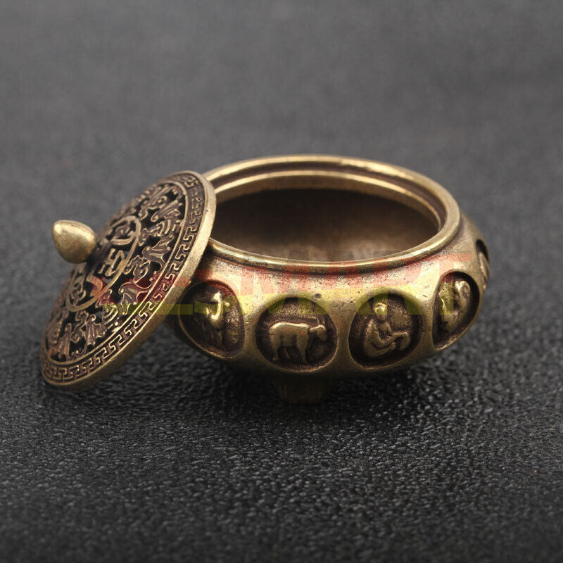 Hand-carved solid copper Zodiac incense burner featuring 12 Chinese animal figurines for home d�cor.